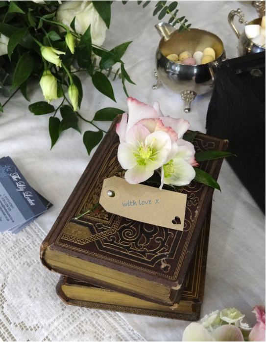 picture old books and corsage for wedding