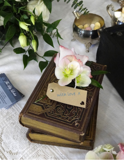 picture old books and corsage for wedding