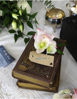 picture old books and corsage for wedding